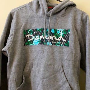 Diamond Supply Co. Hoodie gray hoodie with blue flowers around the logo.